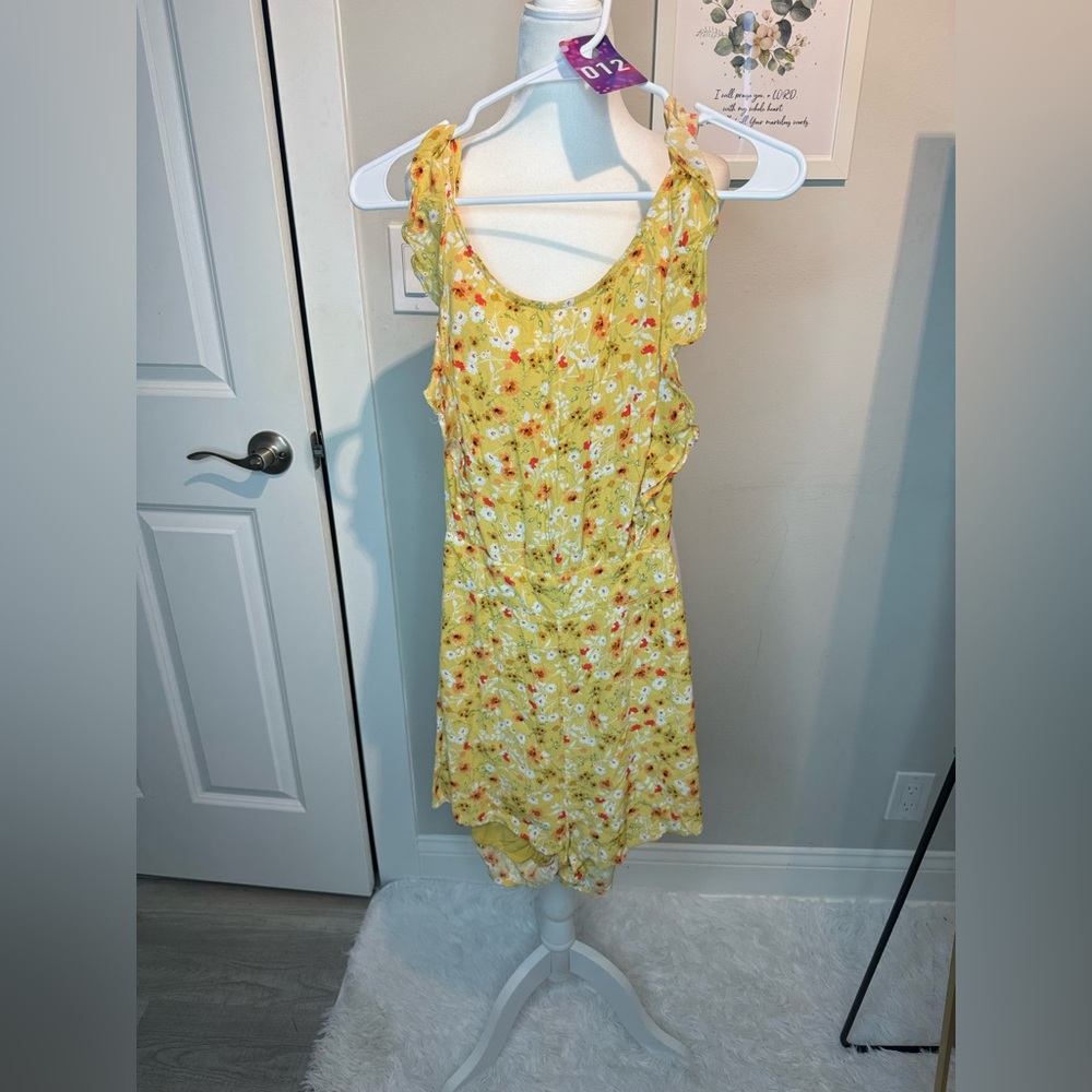 #012 yellow floral romper size S